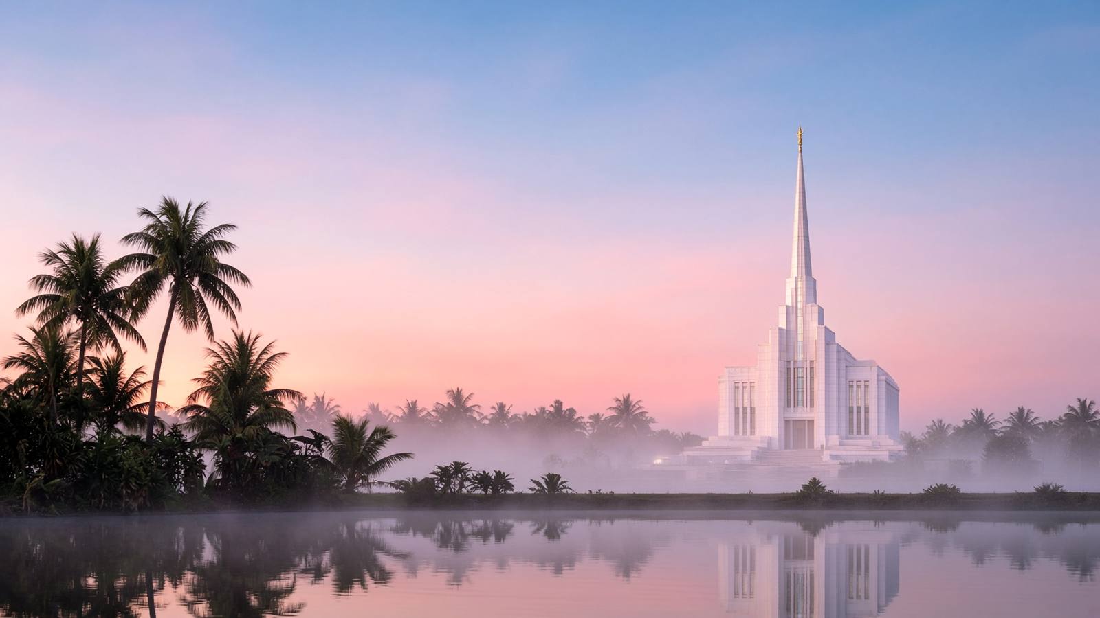 White temple with a single spire at dawn